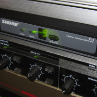 Photo showing close-up of the sure Radio Mic and speaker crossover unit